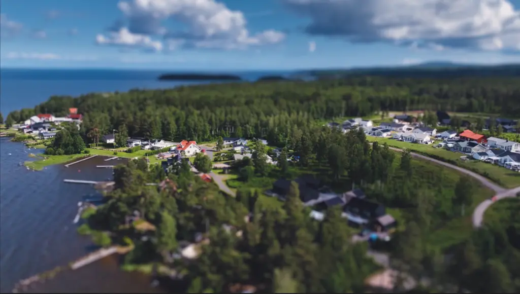 Flygbild av Nordskog i Källby med Vänern.