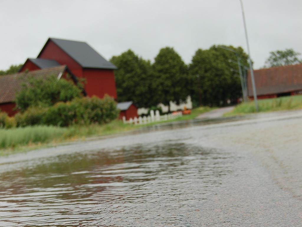Översvämmad väg i Fullösa
