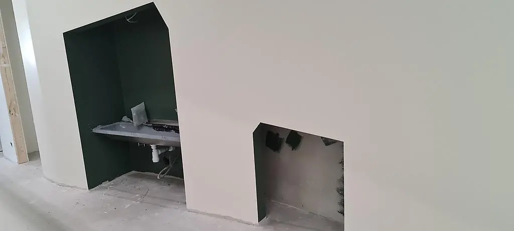 En liten vrå för barnen att tvätta händerna på och ett mysigt "krypin".