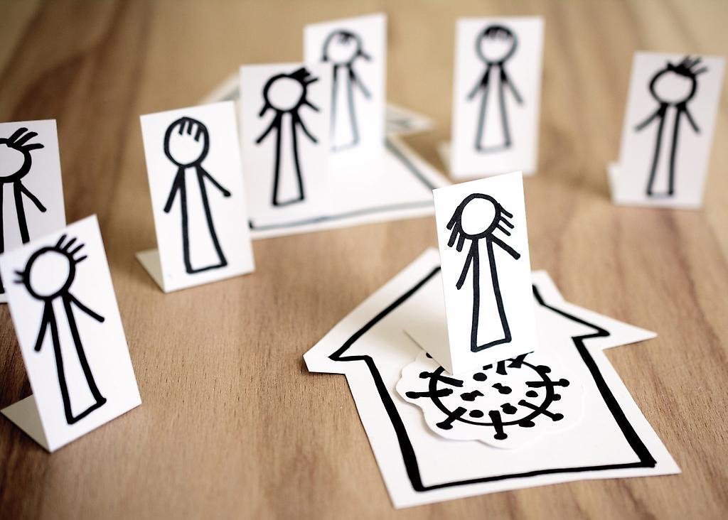 Illustration av människor som håller avstånd på grund av covid-19.